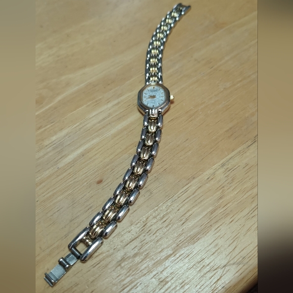 X Citizen Quartz Two tone silver case gold bezel 2 hand movement and hour main image 5
